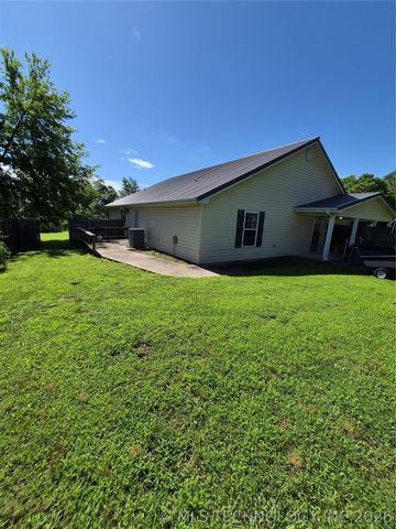 911 W Creek, Checotah, OK 74426