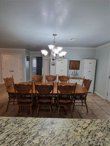 911 W Creek, Checotah, OK 74426