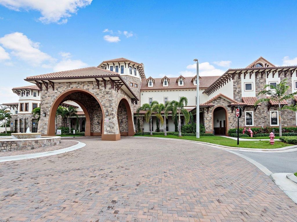 Image 54 of property listing at 8433 Blue Cove Way 8433, Parkland, FL 33076