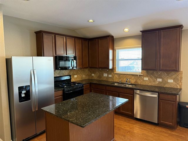 419 Strawberry Blonde DR, Buda, TX 78610