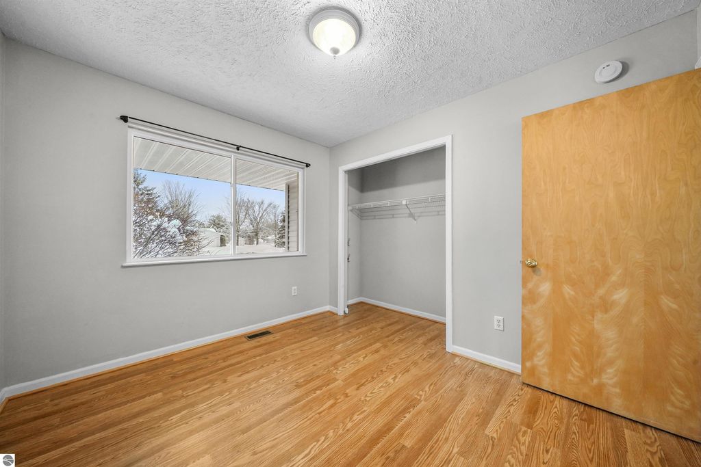 Image 16 of property listing at 5776 Cherry Blossom Drive, Traverse City, MI 49684