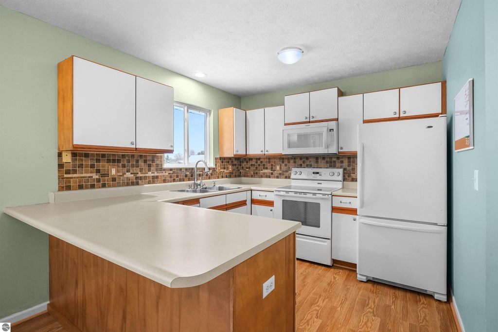 Image 5 of property listing at 5776 Cherry Blossom Drive, Traverse City, MI 49684