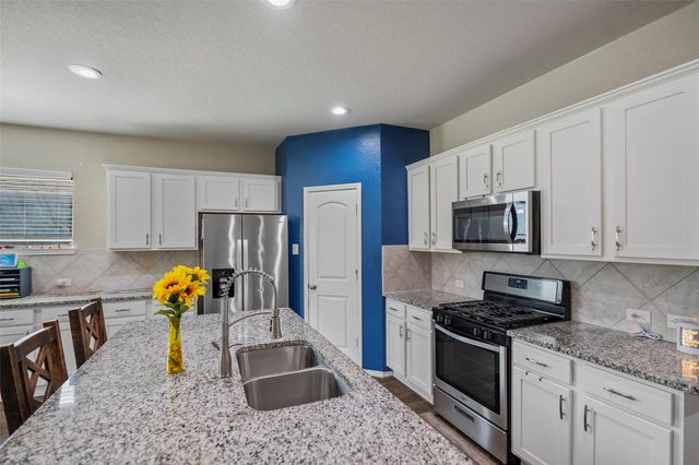 15222 Dinnet Berm Drive, Humble, TX 77346