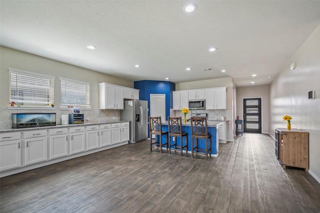 15222 Dinnet Berm Drive, Humble, TX 77346