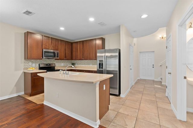 6058 TIVOLI GARDENS BOULEVARD, Orlando, FL 32829