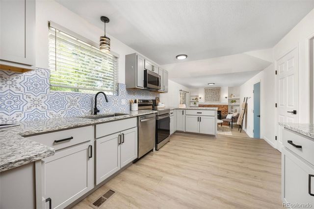 13275 W 63rd Place, Arvada, CO 80004