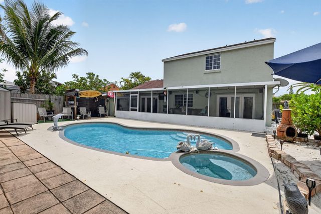 9976 Robins Nest Road, Boca Raton, FL 33496