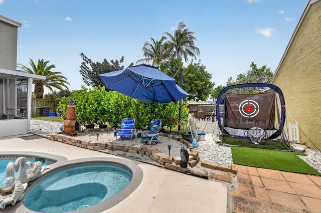 9976 Robins Nest Road, Boca Raton, FL 33496