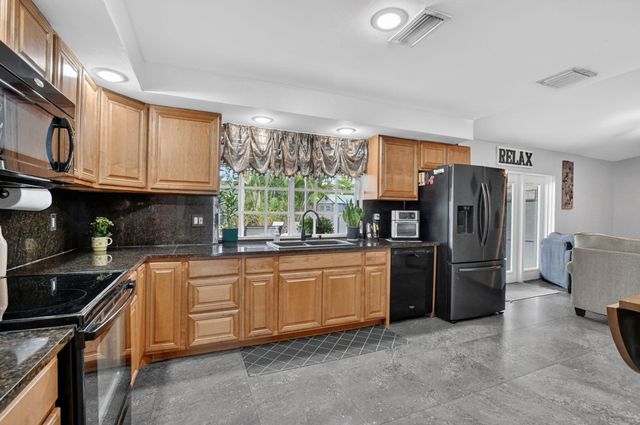9976 Robins Nest Road, Boca Raton, FL 33496