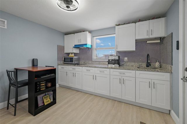 1118 EXCALIBUR STREET, Holiday, FL 34690