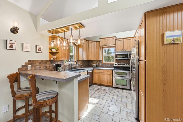 30880 Manitoba Drive, Evergreen, CO 80439