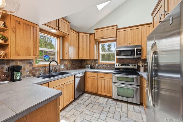 30880 Manitoba Drive, Evergreen, CO 80439