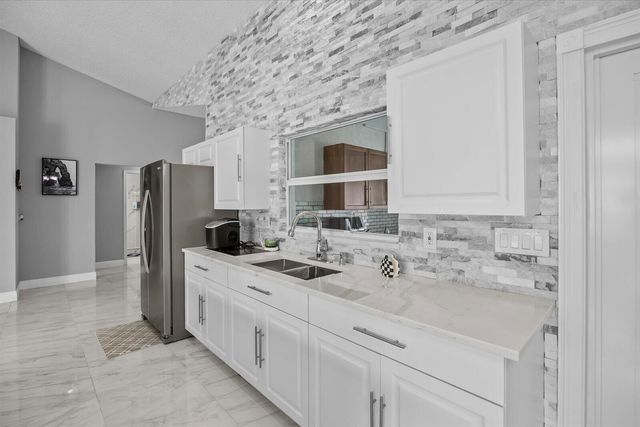 471 NW Sherbrooke Avenue, Port St. Lucie, Port St Lucie, FL 34983