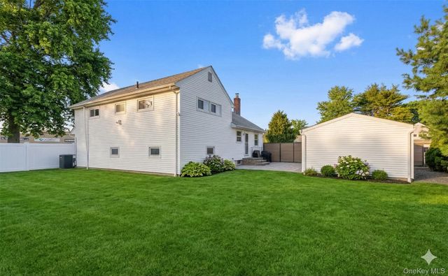 557 Woodbury Road, Plainview, NY 11803