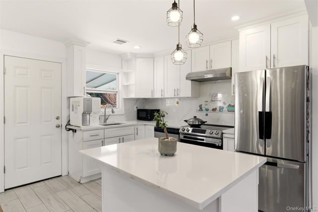 557 Woodbury Road, Plainview, NY 11803