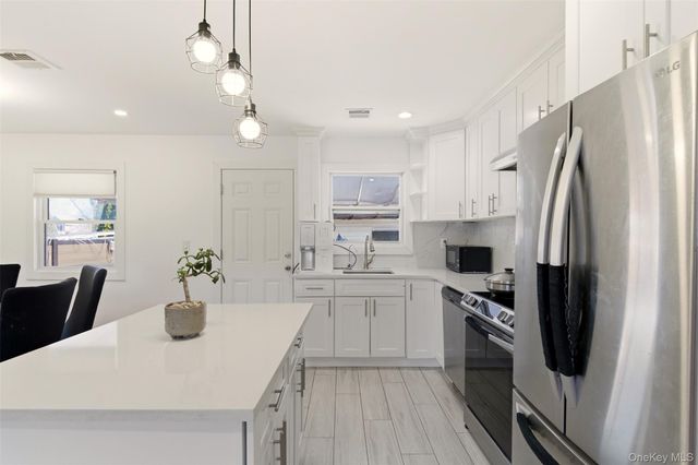 557 Woodbury Road, Plainview, NY 11803