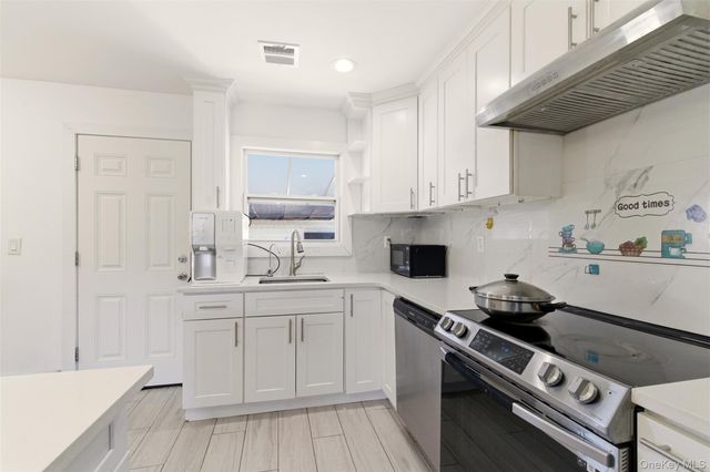 557 Woodbury Road, Plainview, NY 11803