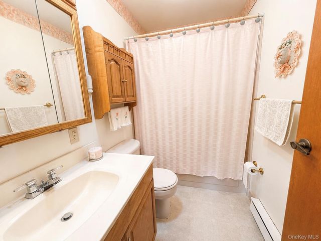258 Newcastle Court F, Ridge, NY 11961