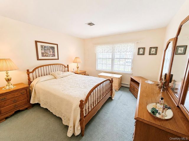 258 Newcastle Court F, Ridge, NY 11961