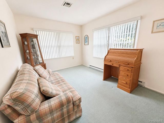 258 Newcastle Court F, Ridge, NY 11961