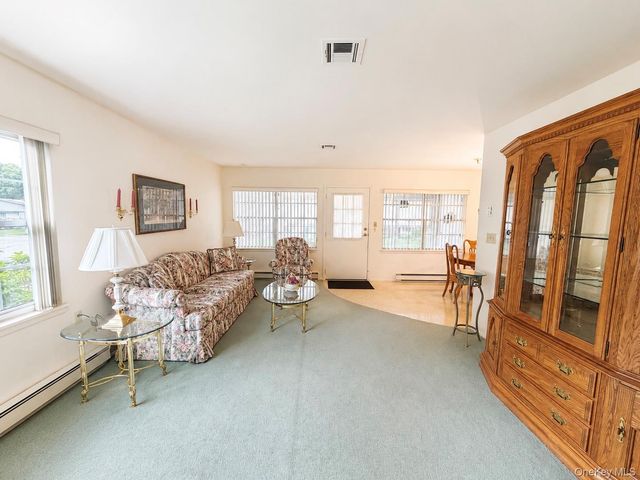 258 Newcastle Court F, Ridge, NY 11961