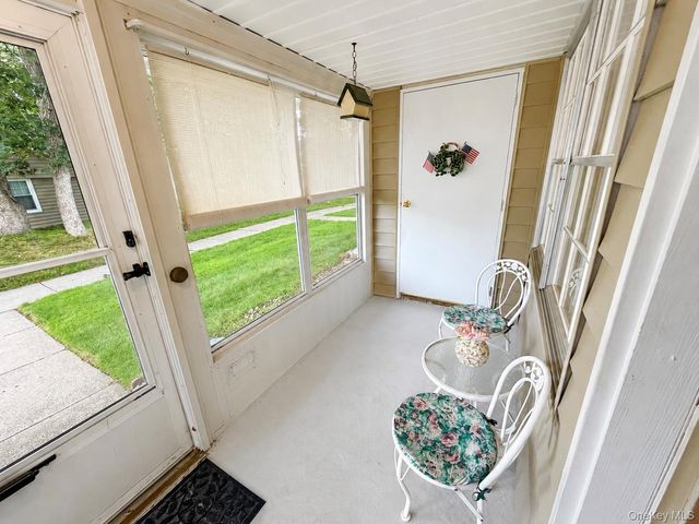 258 Newcastle Court F, Ridge, NY 11961