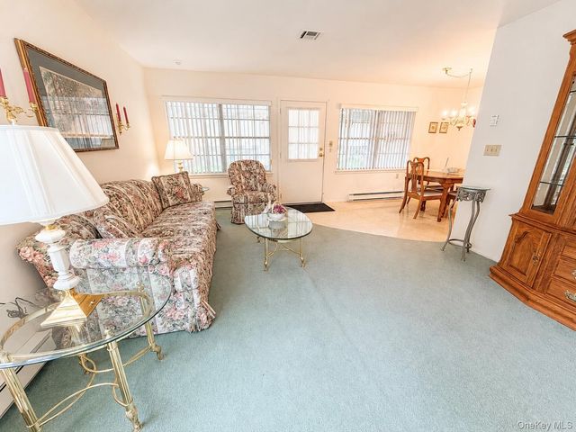 258 Newcastle Court F, Ridge, NY 11961
