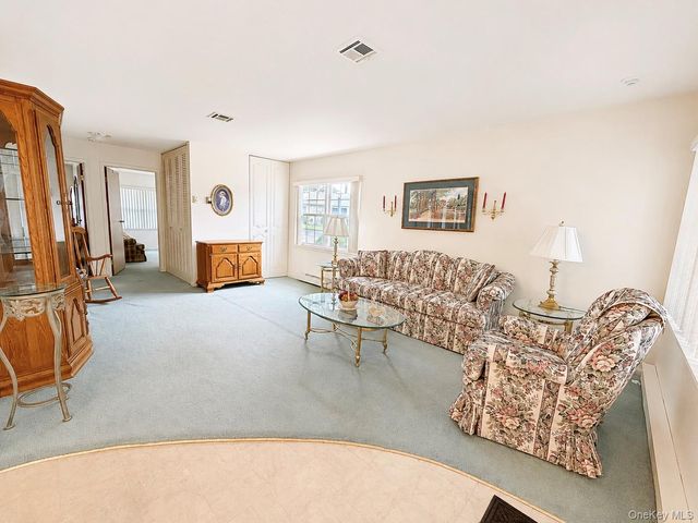 258 Newcastle Court F, Ridge, NY 11961