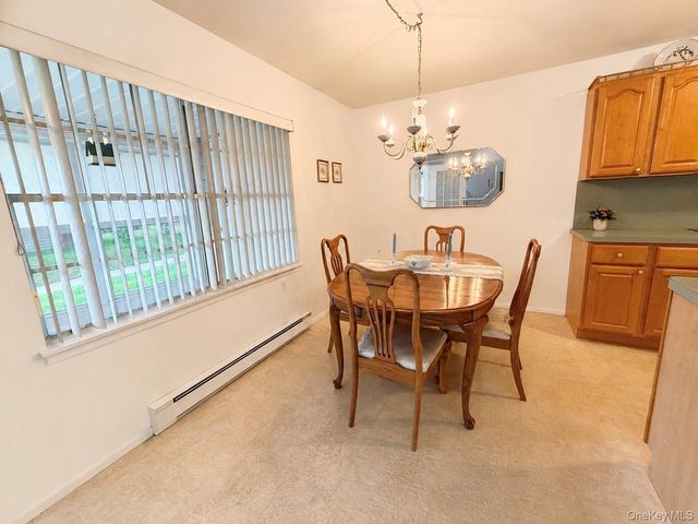 258 Newcastle Court F, Ridge, NY 11961