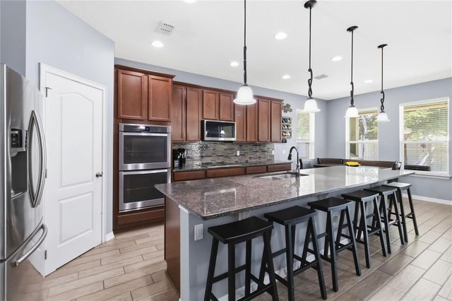 5053 TORCHWOOD DRIVE, Minneola, FL 34715