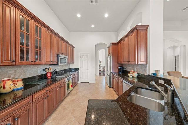 11982 Heather Woods CT, Naples, FL 34120