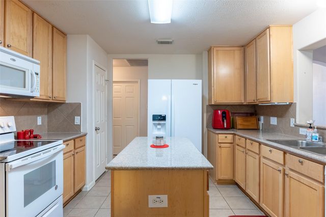1102 Wiley Drive, Magnolia, TX 77354