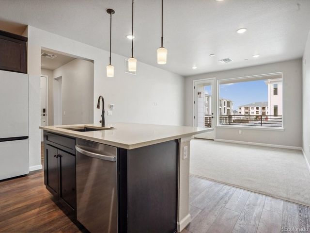 6153 N Ceylon St 10-207, Denver, CO 80249