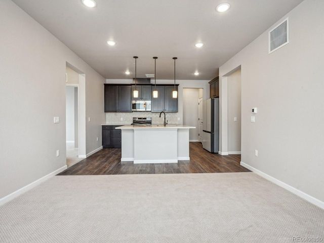 6153 N Ceylon St 10-207, Denver, CO 80249