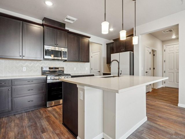 6153 N Ceylon St 10-207, Denver, CO 80249