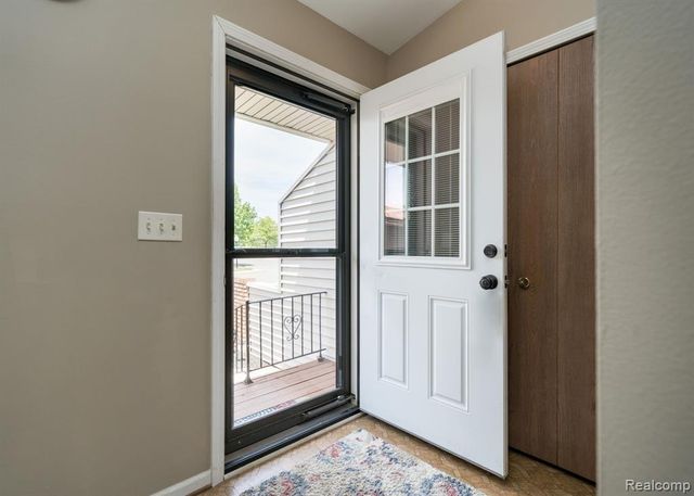 61957 Ticonderoga Drive 1, South Lyon, MI 48178