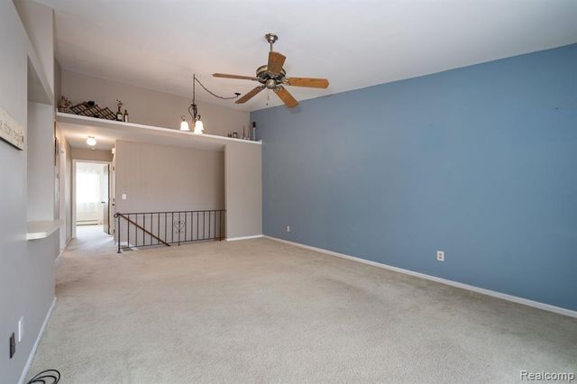 61957 Ticonderoga Drive 1, South Lyon, MI 48178