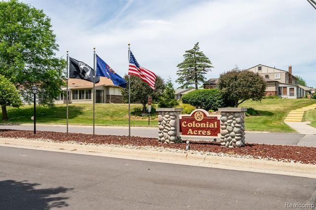 61957 Ticonderoga Drive 1, South Lyon, MI 48178