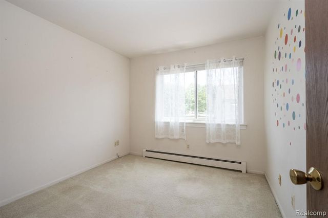 61957 Ticonderoga Drive 1, South Lyon, MI 48178