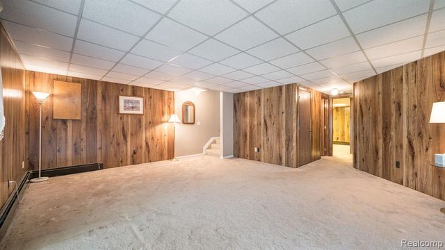 61957 Ticonderoga Drive 1, South Lyon, MI 48178