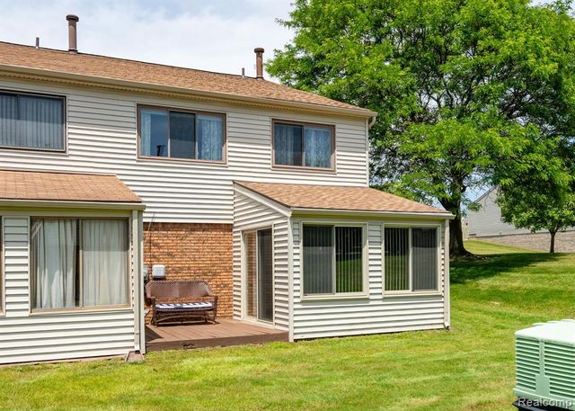 61957 Ticonderoga Drive 1, South Lyon, MI 48178