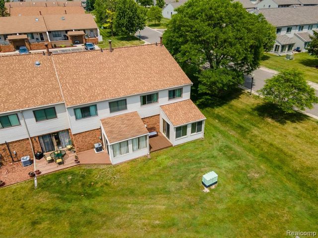 61957 Ticonderoga Drive 1, South Lyon, MI 48178