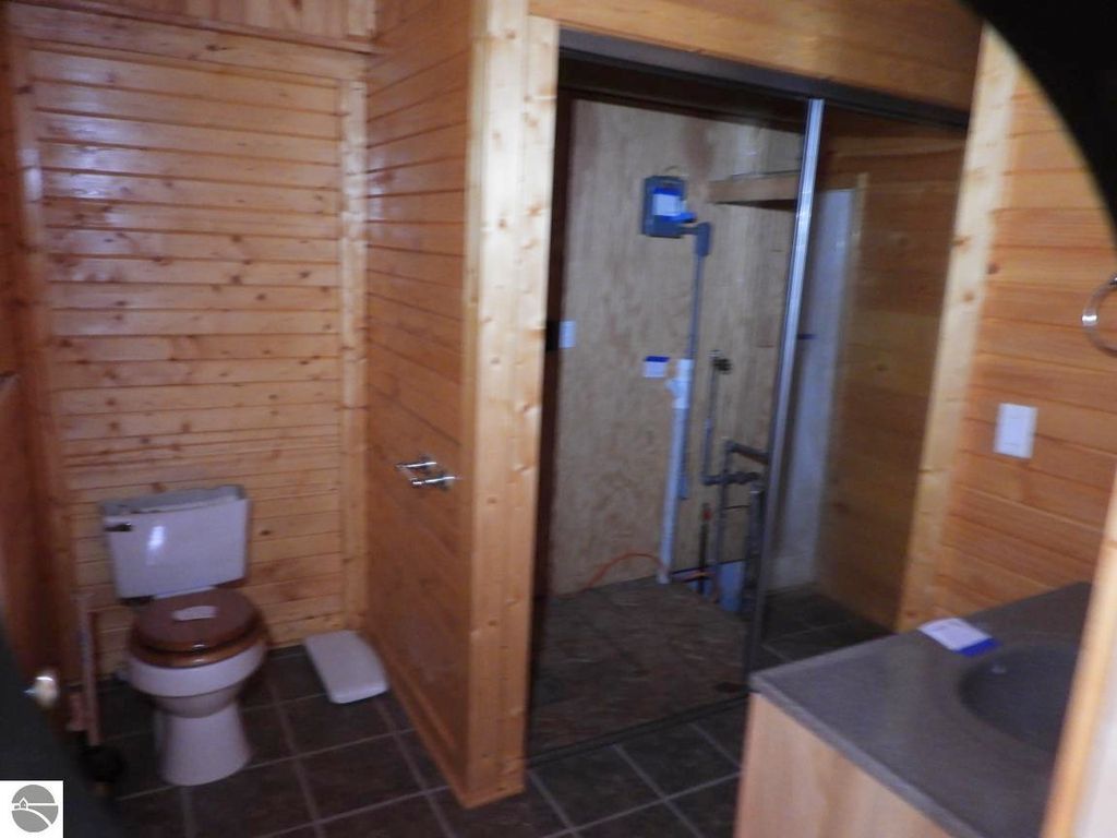 Image 8 of property listing at 7861 N Bass Lake Road, Irons, MI 49644