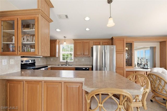 1055 Diamond Lake CIR, Naples, FL 34114