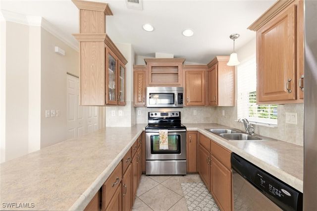 1055 Diamond Lake CIR, Naples, FL 34114