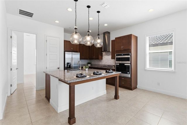 10096 SUNNIFA ALLEY, Orlando, FL 32832