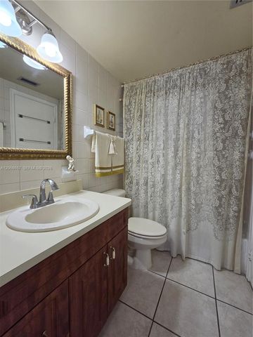 7707 Camino Real B-209, Miami, FL 33143