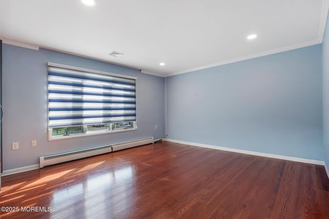 57 Stony Hill Drive, Morganville, NJ 07751