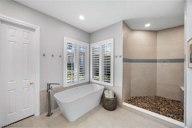 8985 Star Tulip CT, Naples, FL 34113