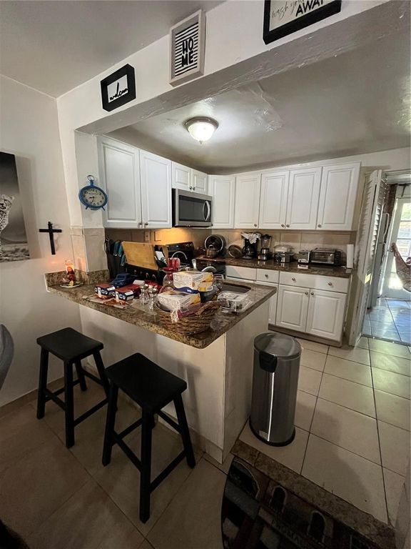 Image 17 of property listing at 995 NW 114TH STREET, Miami, FL 33168